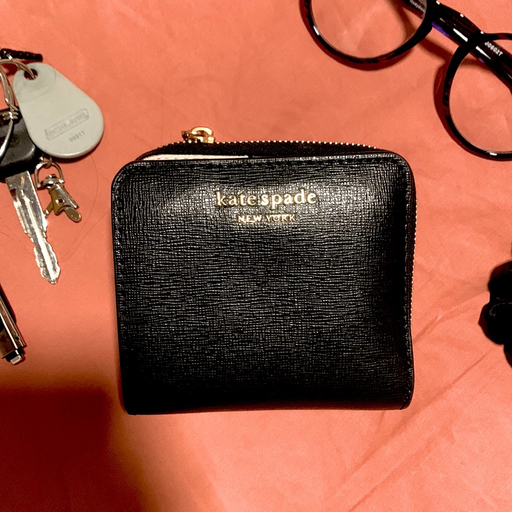 Morgan Small Compact Wallet
Kate Spade black leather wallet
3.75"h x 4"w x1.3"